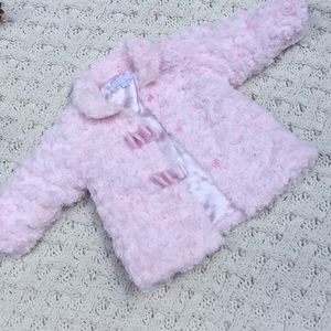 NWOT Soft pink fur coat with satin lining and bows